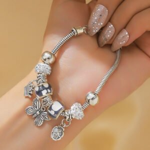 Zinc alloy bead bracelet with crown pendant and lobster clasp - a piece of jewelry featuring a tribal style design.